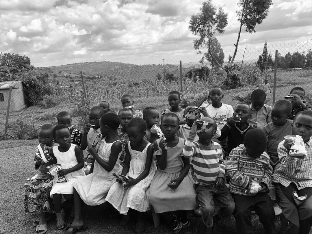Children receiving refreshments during a BaBra Foundation wellbeing activity